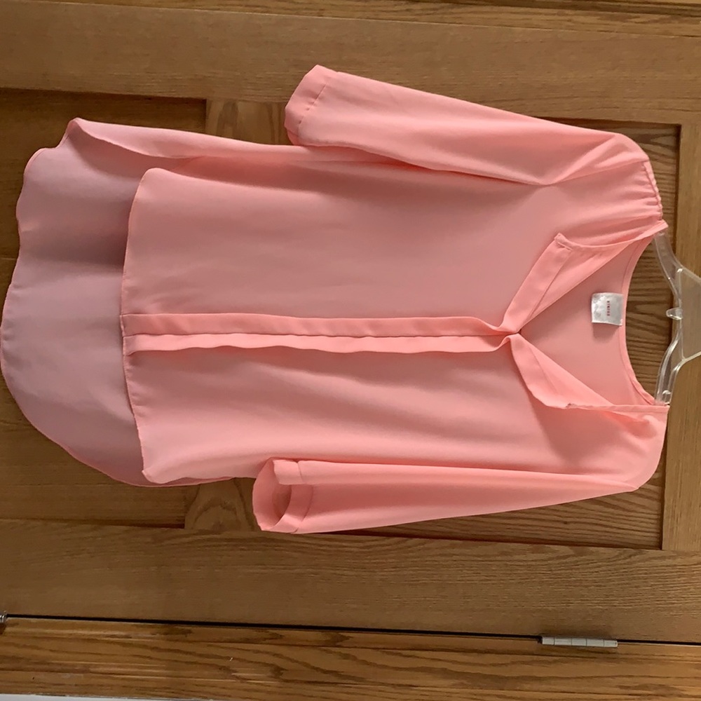 Nymphs brand women’s size small 3/4 sleeved polyester shirt